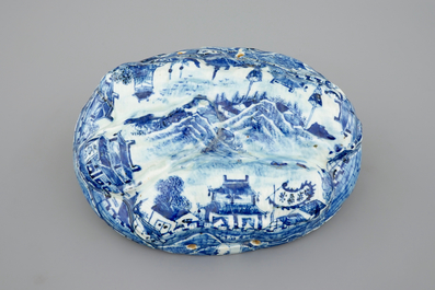 An unusual blue and white Chinese porcelain walnut-shaped hanging ornament or lid, 18th C.