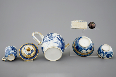 A Chinese blue, white and gilt part tea service with landscapes, Qianlong, 18th C.