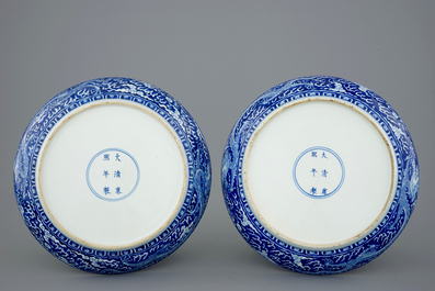 A pair of Chinese blue and white dragon dishes, Kangxi mark and of the period