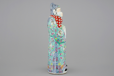 A large Chinese famille rose figure of an immortal, 19/20th C.