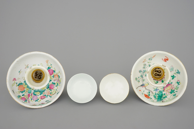 Two Chinese famille rose bowls and two candlesticks, 19th C.