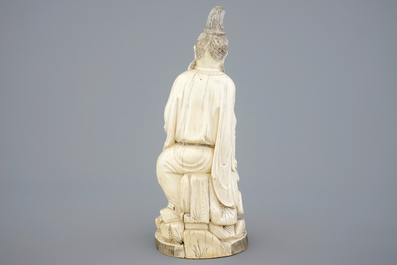 A Chinese carved ivory group of a sage with a child, 19th C.