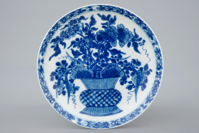 A set of five Chinese blue and white plates with flower baskets, Kangxi