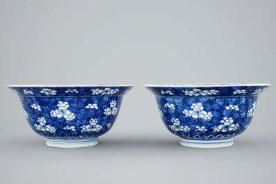 A pair of Chinese blue and white &quot;Prunus on ice&quot; klapmuts bowls, Kangxi
