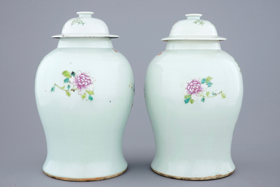 A pair of Chinese famille rose quail vases with covers, 19th C.