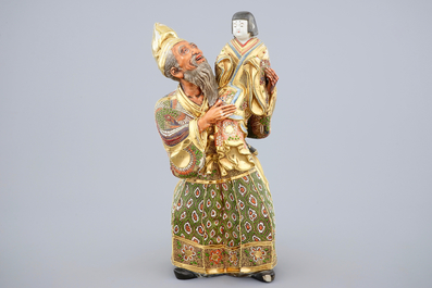 A Japanese enameled brass Ando Jubei box with cover and a large Satsuma figure, 19th C.