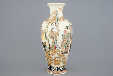 A tall figurative Japanese Satsuma vase, Meiji, 19th C.