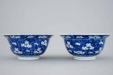 A pair of Chinese blue and white &quot;Prunus on ice&quot; klapmuts bowls, Kangxi