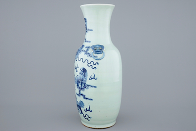 A fine Chinese blue and white on celadon ground porcelain vase with foo dogs, 19th C.