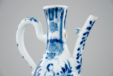 A small Chinese blue and white jug with a naked European, Kangxi