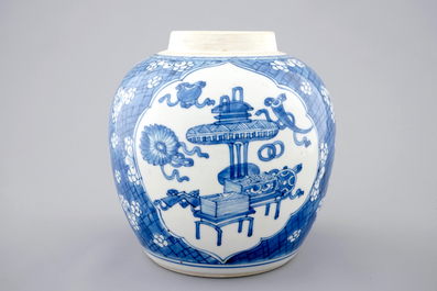 A Chinese blue and white ginger jar with precious objects, Kangxi