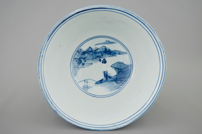 A Chinese blue and white bowl with a continuous landscape design, Ming Dynasty