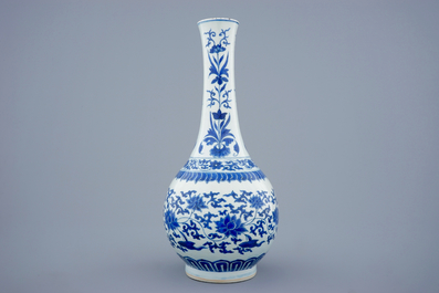 A blue and white Chinese lotus scroll bottle vase, Transitional period, 1620-1683