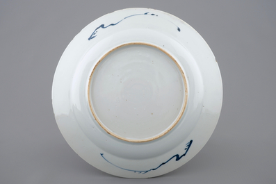 A rare Chinese blue and white plate after a Dutch Delft example, Qianlong, 18th C.