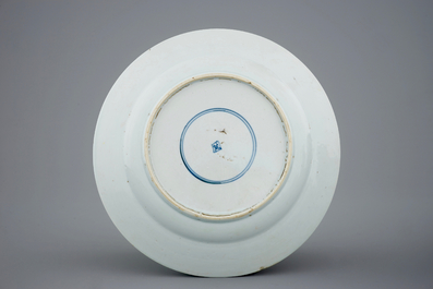 A Chinese famille rose plate with playing boys, Yongzheng, 1723-1735