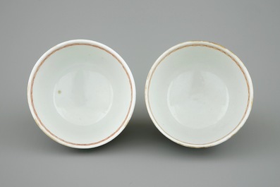 A pair of Chinese famille rose cups and saucers with cherry pickers, Qianlong, 18th C.
