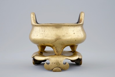 A gilt bronze censer on leaf form base, Ming Dynasty