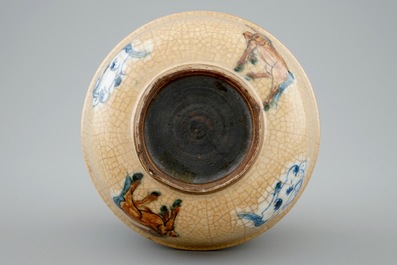 A globular Chinese vase with horses on a crackled brown ground, 18/19th C.