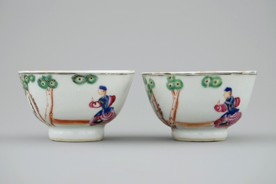 A pair of Chinese famille rose cups and saucers with cherry pickers, Qianlong, 18th C.