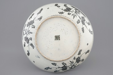 A Chinese Swatow dish with a blue-grey design of fish, Ming Dynasty, 16/17th C.