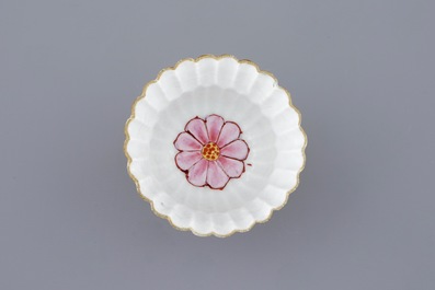 A Chinese famille rose lotus-shaped cup and saucer, Yongzheng, 1723-1735