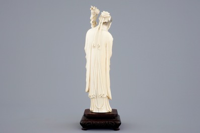 A Chinese ivory figure of Zhongli Quan on stand, late 19th C.