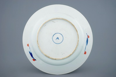 A Chinese Imari style charger with floral scrolls, Kangxi