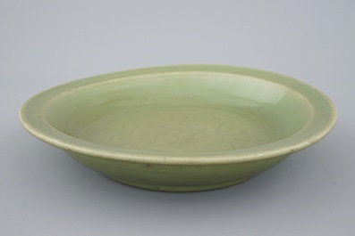 A large Longquan celadon dish with incised floral design, Ming Dynasty, 15th C.