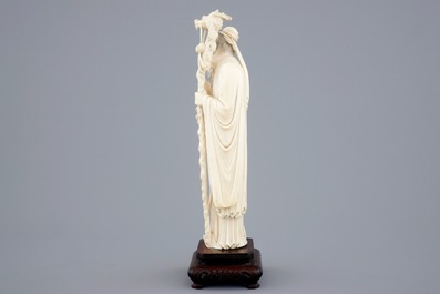 A Chinese ivory figure of Zhongli Quan on stand, late 19th C.