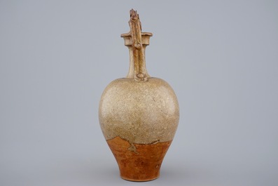 A Chinese stoneware amphora vase with dragon handles, Tang dynasty, 7th C.