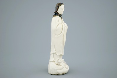 An unusual Chinese Dehua blanc de Chine figure of a black-scarved Luohan, 19th C.