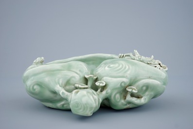 A Chinese monochrome celadon glazed brushwasher formed as a lingzhi fungus, 19th C.