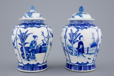 A pair of Chinese blue and white vases and covers with long Elizas, 19th C.