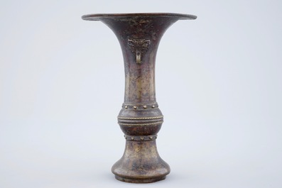 A marked Chinese bronze gu vase with traces of gilt lacquer, late Ming Dynasty