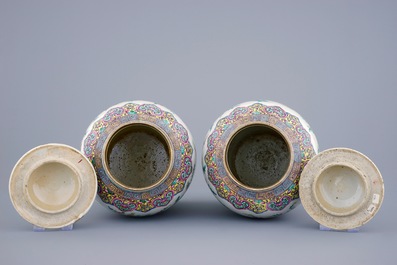 A pair of Chinese famille rose baluster jars and covers with roosters, 19th C.