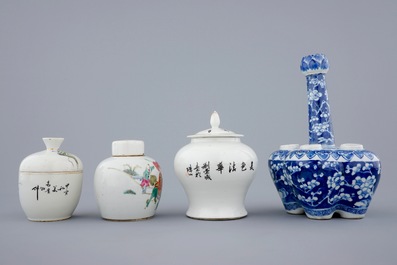 A Chinese blue and white tulip vase and 3 small famille rose covered jars, 19th C.