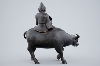 A Chinese bronze incense burner in the shape of a sage riding a buffalo, 19th C.