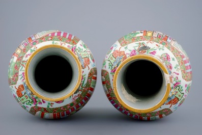 A pair of Chinese Canton famille rose vases with ruyi scepter handles, 19th C.