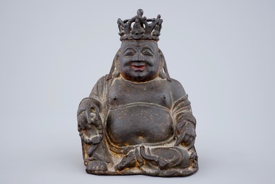 A Chinese gilt and lacquered bronze figure of crowned laughing Buddha, Ming Dynasty