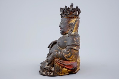 A Chinese gilt and lacquered bronze figure of crowned laughing Buddha, Ming Dynasty