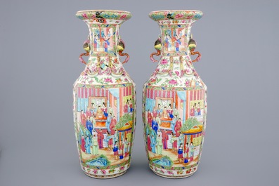 An excellent pair of Chinese Canton famille rose vases with duck handles, 19th C.