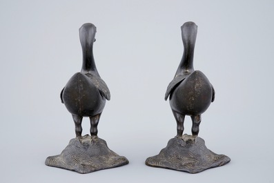 A pair of Chinese bronze duck-shaped incense burners, 18/19th C.