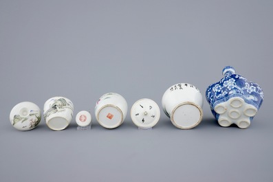 A Chinese blue and white tulip vase and 3 small famille rose covered jars, 19th C.