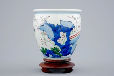 A Chinese wucai brush pot on wooden stand, Transitional period, 1620-1683