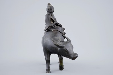 A Chinese bronze incense burner in the shape of a sage riding a buffalo, 19th C.