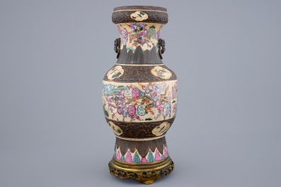 A Chinese Nanking famille rose crackle vase on bronze foot, 19th C.
