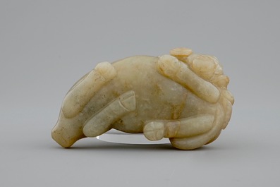 A Chinese jade group of a boy on a buffalo, 18/19th C.