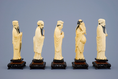 A set of 5 Chinese carved ivory figures of immortals on wooden bases, 19th C.