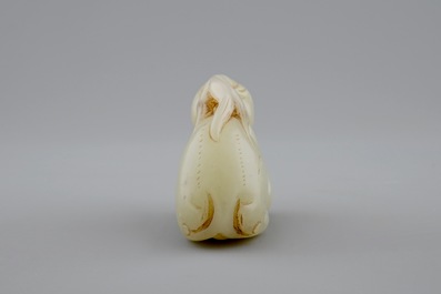 A Chinese celadon carving of an archaic deer, 18/19th C.