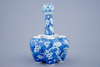 A Chinese blue and white tulip vase with prunus design, 19th C.